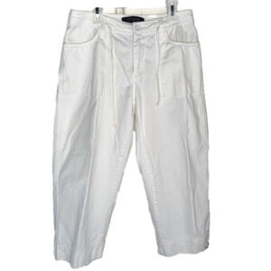White cargo pants/jeans, no stains and flaws. flowy with built on string belt